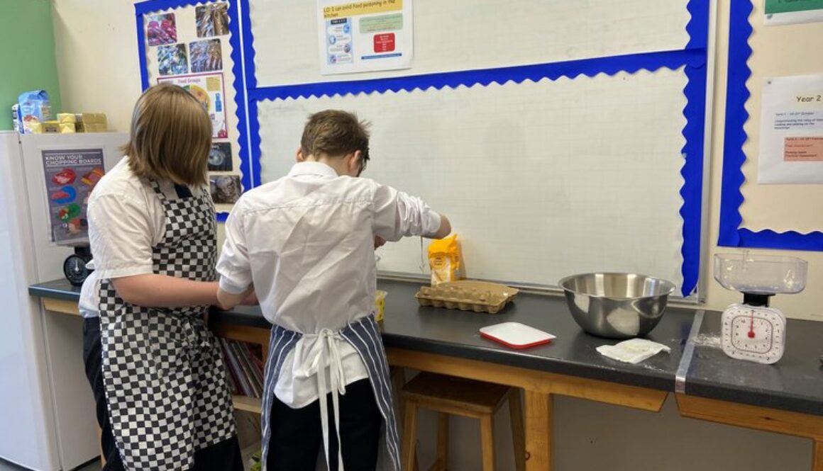 2 boys cooking