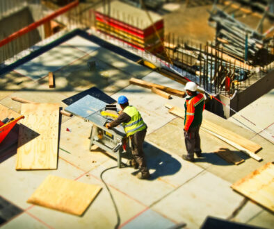 Construction workers working at building site