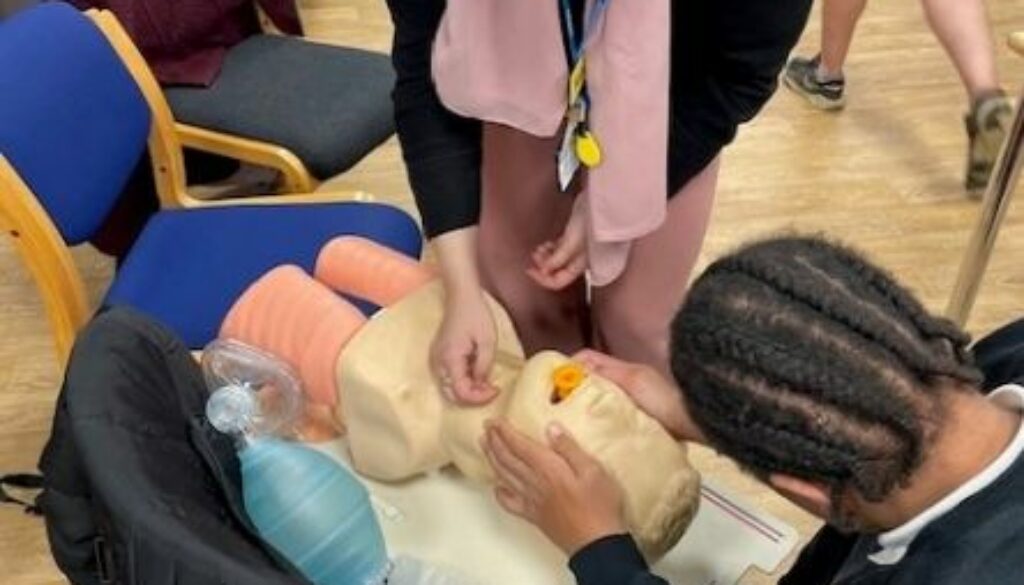 Student learning CPR