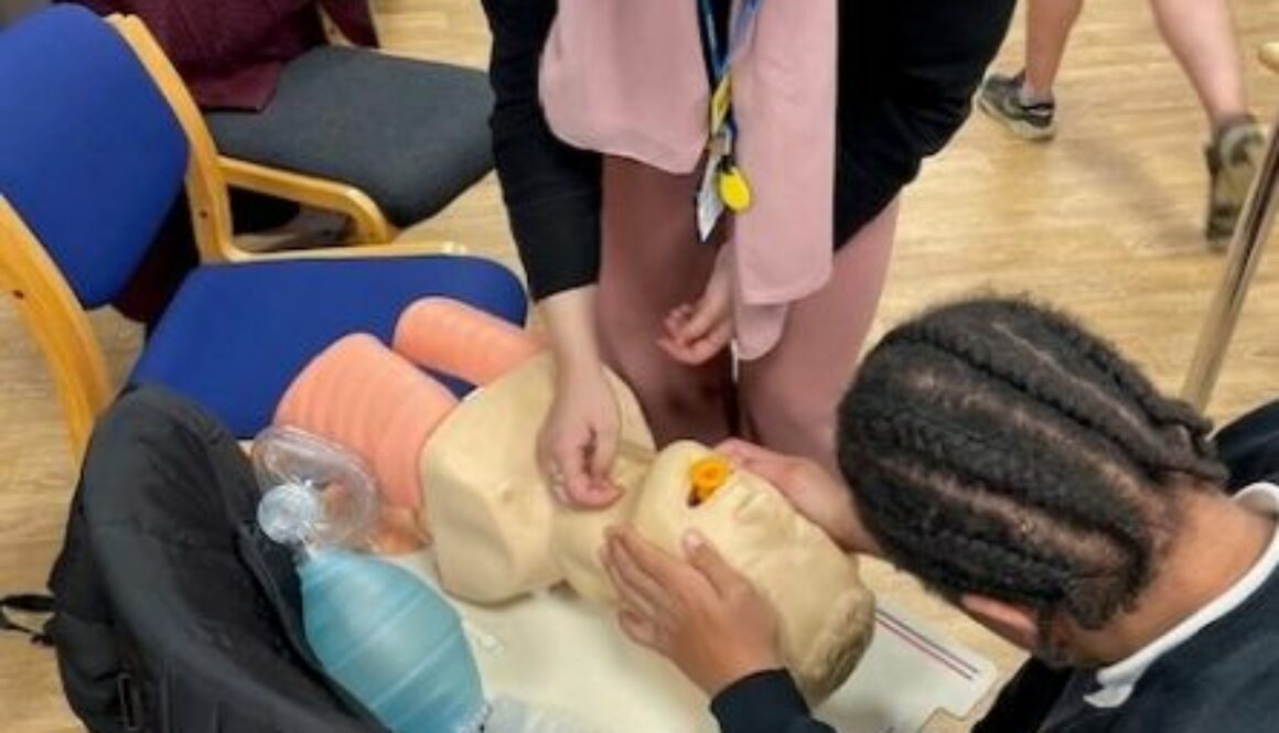 Student learning CPR