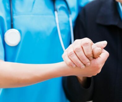 nurse holding hand