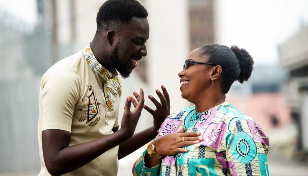 couple chattign and laughing